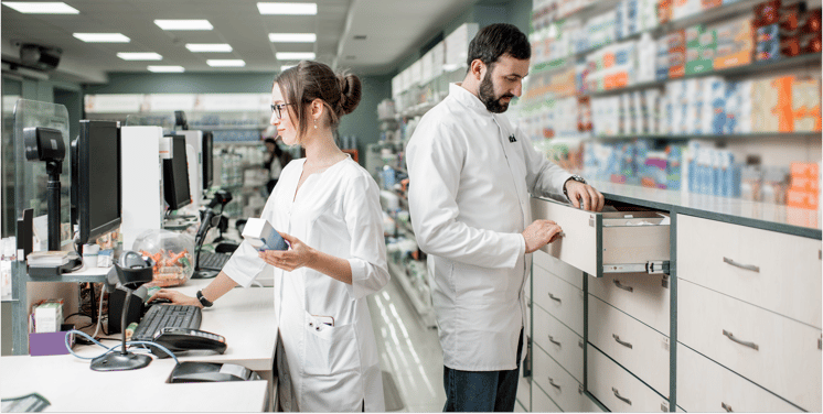 pharmacists-working-in-the-pharmacy-store-2023-11-27-05-19-32-utc 1